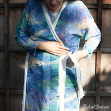 Load image into Gallery viewer, Artist Rachael Grad in purple yellow floral bathrobe long