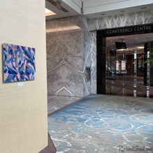 Load image into Gallery viewer, Purple Flowers Abstract Art by Artist Rachael Grad outside the conference centre of the Hilton Toronto Markham Suites