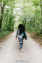 Load image into Gallery viewer, black and white yoga leggings by Canadian Artist Rachael Grad back view