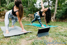 Load image into Gallery viewer, black and women's leggings by Canadian Artist Rachael Grad on women practicing yoga