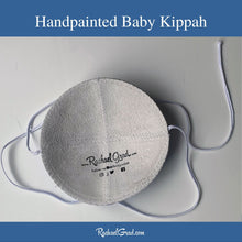 Load image into Gallery viewer, inside of baby kippah hand painted by Toronto artist Rachael Grad.jpg