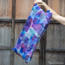 Load image into Gallery viewer,  purple pillow 24 x 12 by Toronto Artist Rachael Grad in hand side view