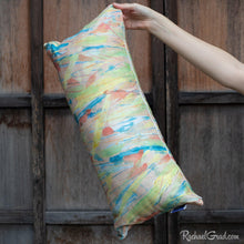 Load image into Gallery viewer, yellow pillow 24 x 12 by Toronto Artist Rachael Grad in hand
