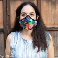 Artist Rachael Grad in rainbow face mask front view