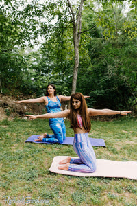 Blue Abstract Art Women's Yoga Leggings by Canadian Artist Rachael Grad with 2 women doing pilates