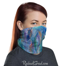 Load image into Gallery viewer, Face mask with full coverage in blue green art by artist Rachael Grad side view on woman