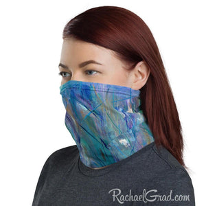 Face mask with full coverage in blue green art by artist Rachael Grad side view