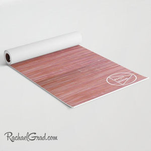 Pink and Purple Yoga Mat for Pilates on Demand rolled up 