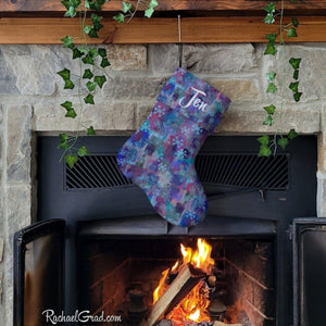 Snowflake art stocking over fireplace by Toronto artist Rachael Grad