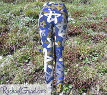 Load image into Gallery viewer, Stars Chanukah Leggings by Toronto Artist Rachael Grad grass background back view