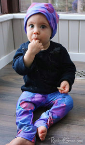 Valentines baby beanie hat with hearts on baby Rachel by Artist Rachael Grad matching leggings