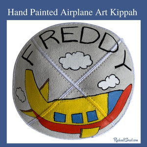 hand painted airplane art kippah by Toronto artist Rachael Grad