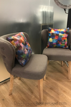 Load image into Gallery viewer, Bold Multicolor Pillows by Toronto artist Rachael Grad on Grey Chairs