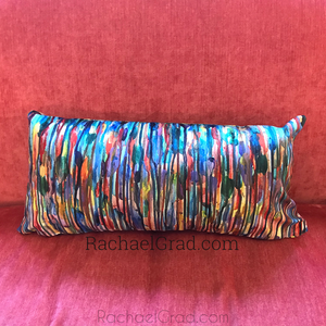 Fluid Long Pillowcase MultiColor 2 Bright on pink couch by artist Rachael Grad