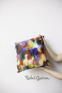 Colorful Art Pillow in 2 Hands by Toronto Artist Rachael Grad